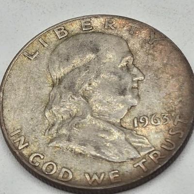 LOT 136: Thirteen Ben Franklin Silver Half Dollars