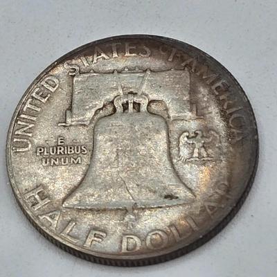 LOT 136: Thirteen Ben Franklin Silver Half Dollars