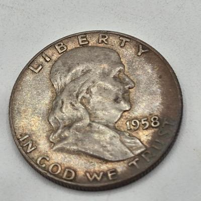 LOT 136: Thirteen Ben Franklin Silver Half Dollars