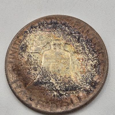 LOT 136: Thirteen Ben Franklin Silver Half Dollars