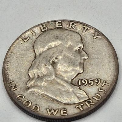 LOT 136: Thirteen Ben Franklin Silver Half Dollars