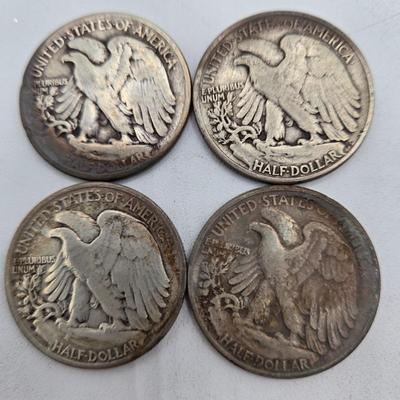 LOT 143: Twenty Silver Walking Liberty Half Dollars