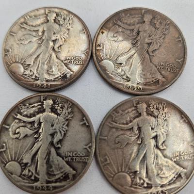 LOT 143: Twenty Silver Walking Liberty Half Dollars