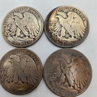 LOT 143: Twenty Silver Walking Liberty Half Dollars
