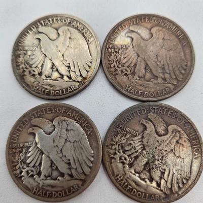 LOT 143: Twenty Silver Walking Liberty Half Dollars
