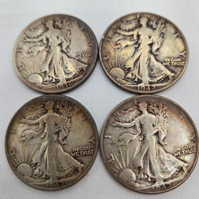 LOT 143: Twenty Silver Walking Liberty Half Dollars