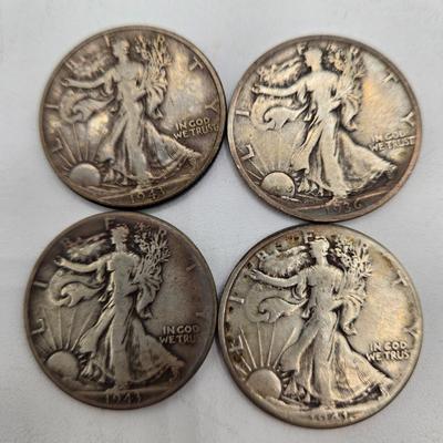 LOT 143: Twenty Silver Walking Liberty Half Dollars