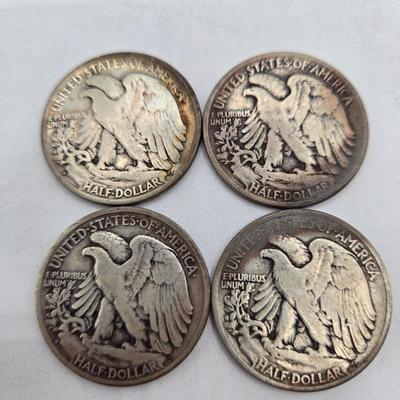 LOT 144: Twenty Silver Walking Liberty Half Dollars