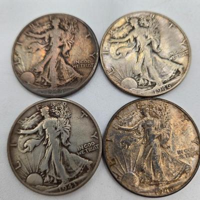 LOT 144: Twenty Silver Walking Liberty Half Dollars