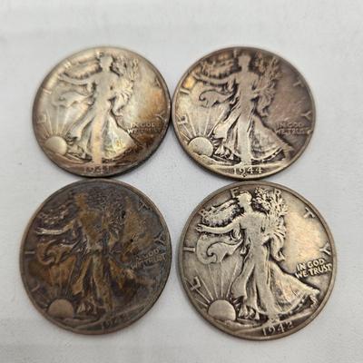 LOT 144: Twenty Silver Walking Liberty Half Dollars