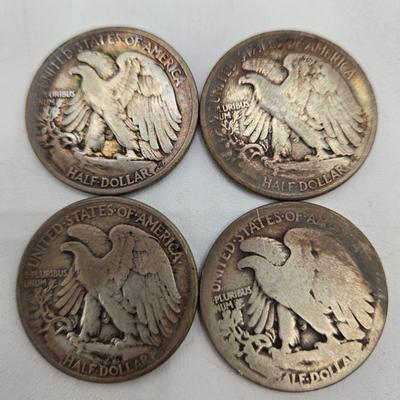 LOT 144: Twenty Silver Walking Liberty Half Dollars