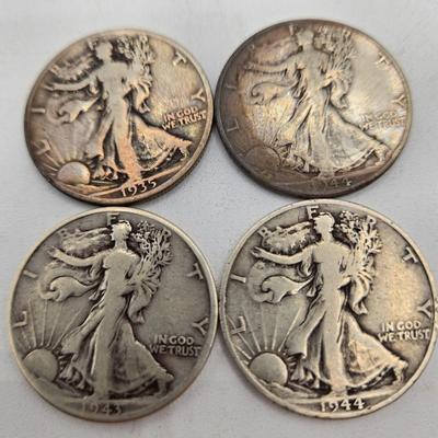 LOT 145: Twenty Silver Walking Liberty Half Dollars