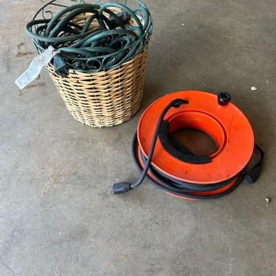 Sale Photo Thumbnail #119: Small wicker and metal trash can and outdoor extension cords