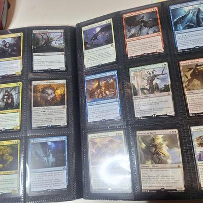 Sale Photo Thumbnail #622: the binder on the left has several cards in it, the one on the right doesn't have any.  See photos