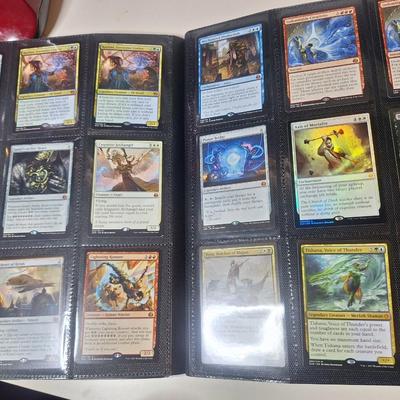 Sale Photo Thumbnail #623: the binder on the left has several cards in it, the one on the right doesn't have any.  See photos