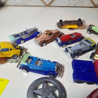 Sale Photo Thumbnail #674: 1 is a hotwheel the others are plastic cars