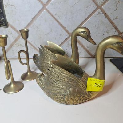 Sale Photo Thumbnail #690: Brass ducks and candlesticks