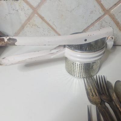 Sale Photo Thumbnail #740: vintage potato ricer and silverpate flatware etc