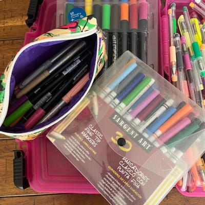 Sale Photo Thumbnail #161: Large amount of Sharpie markers and other markers, gel pens and more in plastic containers plus several coloring books in a canvas tote