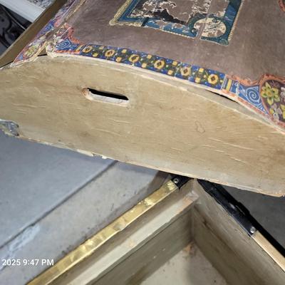 Sale Photo Thumbnail #8: This was probably called a wall trunk instead of a steamer trunk because it opens and the lid stays upright for tighter spqces like trains. Probably manufactured in 1880-1890s, amazing good shape, wheeled, leather straps are broken amd the hinges on yhe i