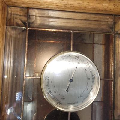 Sale Photo Thumbnail #17: Measures 21.5" tall and 10.5" wide, all guages seem to work and there is a hook on the back for hang. Cut glass on the outside panels and stained inside