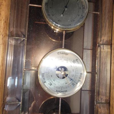 Sale Photo Thumbnail #16: Measures 21.5" tall and 10.5" wide, all guages seem to work and there is a hook on the back for hang. Cut glass on the outside panels and stained inside