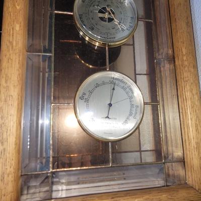 Sale Photo Thumbnail #15: Measures 21.5" tall and 10.5" wide, all guages seem to work and there is a hook on the back for hang. Cut glass on the outside panels and stained inside