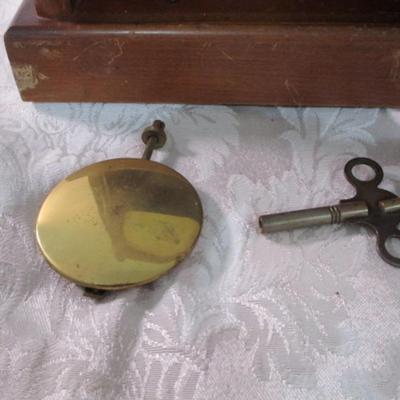 Sale Photo Thumbnail #82: Has pendulum, needs TLC, has winding key that won't wind, 14-1/4" tall x 8-1/4" wide x 4-3/8" deep