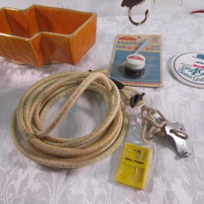 Sale Photo Thumbnail #164: Candles, napkin holder, Vintage Schwinn bicycle pump, travel hanger, Bungee cord 120" long, 2 pkg note cards, etc., See pictures
