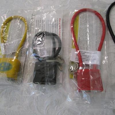Sale Photo Thumbnail #371: Adjustable belt up to 41-1/2", Earplugs, sewing kit, 9 gun locks, Badge holder, knit fabric gun wrap, Ballistic goggle lens, see pictures