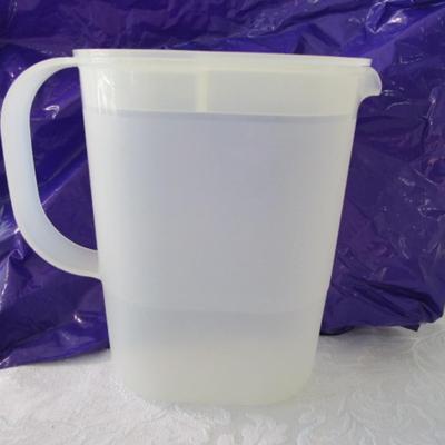Sale Photo Thumbnail #376: 2- 75 oz. cups with  lids & straws, Tupperware pitcher, Rubbermaid 2 liter container, 1 Tupperware bowl, 1 container with no lid, 2 Tupperware coasters