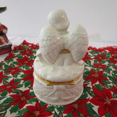 Sale Photo Thumbnail #385: Christmas table runner is 68" long x 15" wide, angel jar is hinged, snow globe is Mickey Mouse & new in box, swan is mounted on a mirror