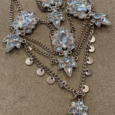 Many tiered necklace with a large bracelet