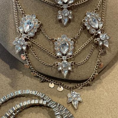Many tiered necklace with a large bracelet