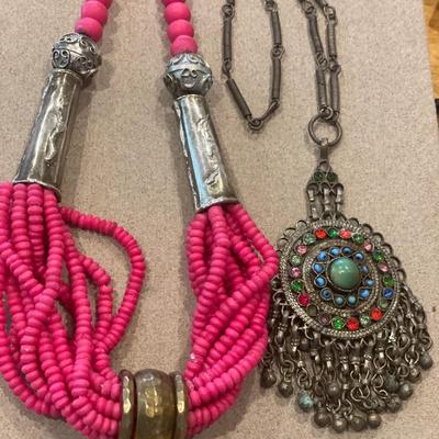 Statement pink tone necklaces