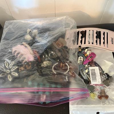 Sale Photo Thumbnail #254: Large bag of hair clips and barrettes and bobby pins and new straightener