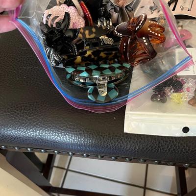 Sale Photo Thumbnail #255: Large bag of hair clips and barrettes and bobby pins and new straightener