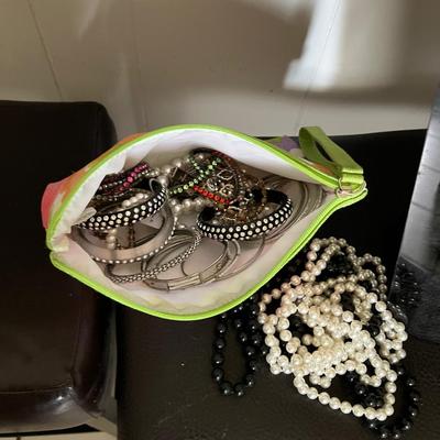 Sale Photo Thumbnail #257: Bag of stretch bracelets and bangles and 2 necklace displays
