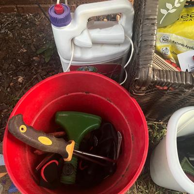Sale Photo Thumbnail #297: Wicker basket with attached lid full of various gardening tools, gloves, chemicals, pots and more