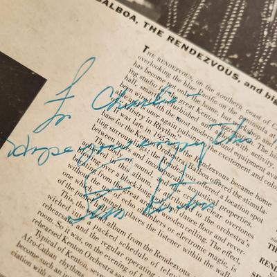 Sale Photo Thumbnail #366: This auction lot is for an Autographed Stan Kenton Vinyl Record.  The record appears to be in good condition but has not been played by us.  The cardboard sleeve has seen some wear and has some splitting to the edges.  Given to our client who was a trombo