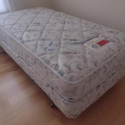 Sealy Posturepedic Twin Mattress and Boxspring Set on Metal Bed Frame