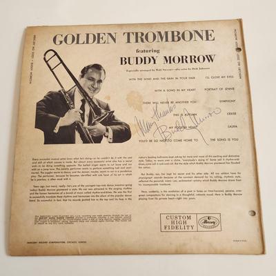 Sale Photo Thumbnail #377: This auction lot is for an Autographed Buddy Morrow Vinyl Record.  The record appears to be in good condition but has not been played by us.  The cardboard sleeve has seen some wear and has some edge splitting and aging to it.  Given to our client who was