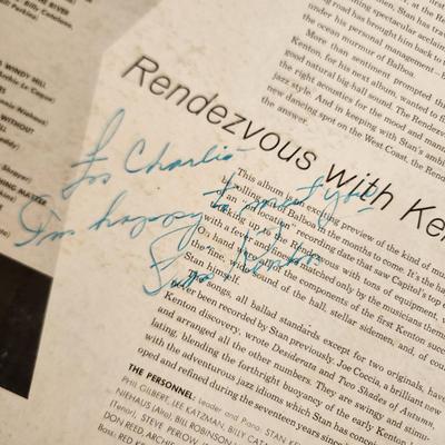 Sale Photo Thumbnail #381: This auction lot is for an Autographed Stan Kenton Vinyl Record.  The record appears to be in good condition but has not been played by us.  The cardboard sleeve has seen some wear and has some edge splitting and aging to it.  Given to our client who was 