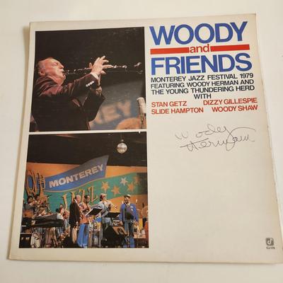 Sale Photo Thumbnail #382: This auction lot is for an Autographed Woody Herman Vinyl Record.  The record appears to be in good condition but has not been played by us.  The cardboard sleeve has seen some wear and has some edge splitting and aging to it.  Given to our client who was