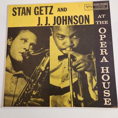 Sale Photo Thumbnail #387: This auction lot is for a Vintage Stan Getz Vinyl Music Album Cover. This is Stan Getz and J.J. Johnson at the Opera House on the Verve Label.  The vinyl record itself was cracked and has been thrown away.  However, this is a very clean and good cover tha