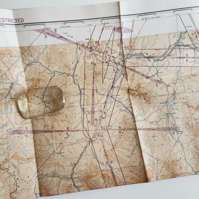 Sale Photo Thumbnail #437: This auction lot is for a Vintage Restricted Aeronautical Chart of Yellowstone National Park.  This large map is dated April 13, 1944 and gives indication of special war lighting restrictions.  Measures about 24X40-inches.  In nice condition for its age.