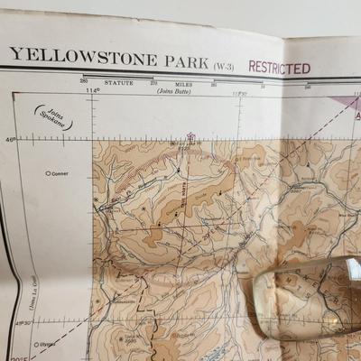Sale Photo Thumbnail #436: This auction lot is for a Vintage Restricted Aeronautical Chart of Yellowstone National Park.  This large map is dated April 13, 1944 and gives indication of special war lighting restrictions.  Measures about 24X40-inches.  In nice condition for its age.