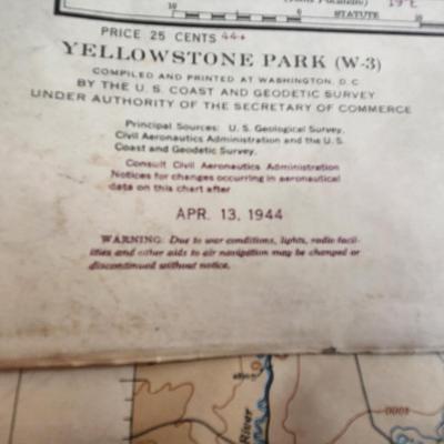Sale Photo Thumbnail #434: This auction lot is for a Vintage Restricted Aeronautical Chart of Yellowstone National Park.  This large map is dated April 13, 1944 and gives indication of special war lighting restrictions.  Measures about 24X40-inches.  In nice condition for its age.