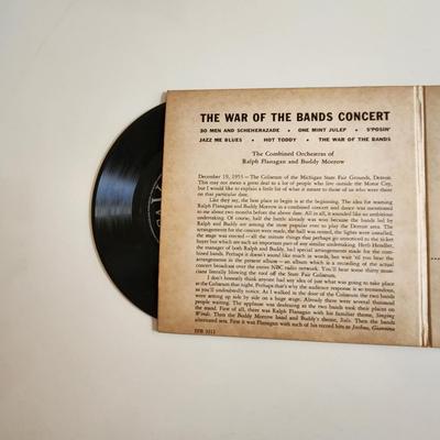Sale Photo Thumbnail #442: This auction lot is for a Vintage 45RPM War of the Bands Concert Record.  This recording on two extended play 45 RPM records are a dueling offering from the likes of the Combined Orchestras of Ralph Flanagan and Buddy Morrow.