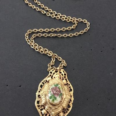 Vintage Rare Ornate flower cameo necklace. Very beautiful. Very nice.